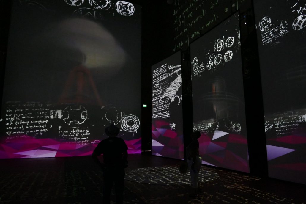 1000693 DaVinci Art film projected on all surfaces of a performance space