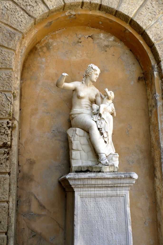 1000717 defaced ancient art, in the back yard of the Pitti Palazzo